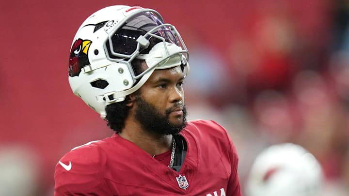 Aug 9, 2025; Glendale, Ariz, U.S.; Arizona Cardinals quarterback Kyler Murray (1) walks the field before their preseason game against the Kansas City Chiefs at State Farm Stadium on Aug. 9, 2025.