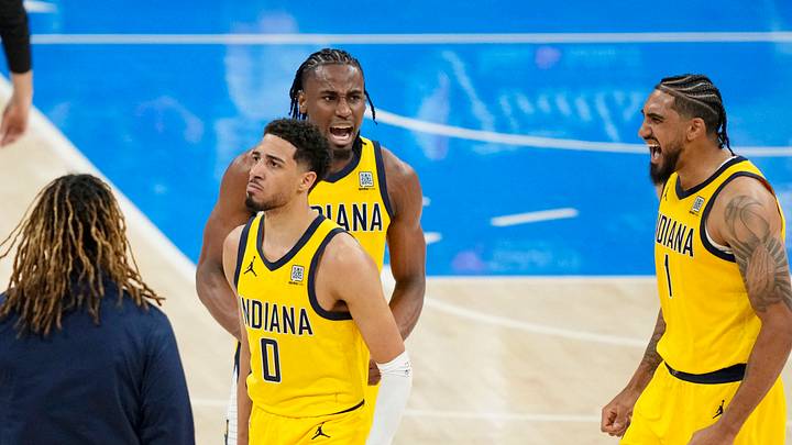 Jun 5, 2025; Oklahoma City, Oklahoma, USA; Indiana Pacers guard Tyrese Haliburton (0), forward Aaron Nesmith (center) and forward Obi Toppin (1) react after a play against the Oklahoma City Thunder in game one of the 2025 NBA Finals at Paycom Center. Mandatory Credit: Kyle Terada-Imagn Images