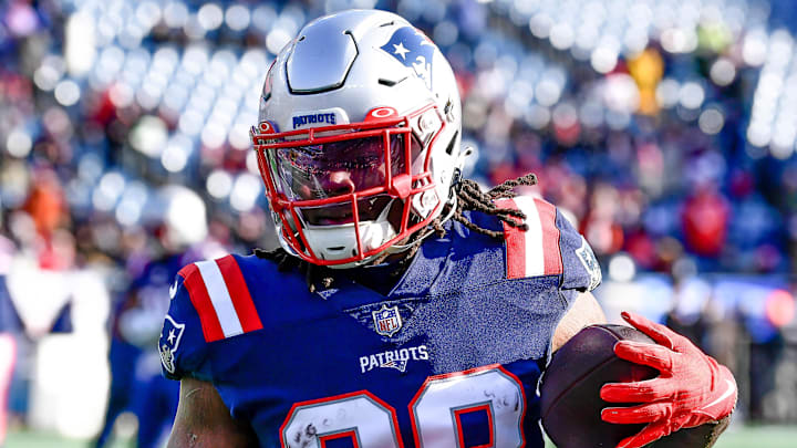 Dec 24, 2022; Foxborough, Massachusetts, USA; New England Patriots running back Rhamondre Stevenson (38) warms up before the start of a game against the Cincinnati Bengals at Gillette Stadium. Mandatory Credit: Eric Canha-Imagn Images