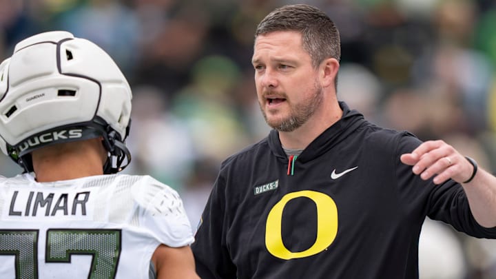 Oregon coach Dan Lanning greets Fighting Ducks running back Jayden Limar before the game as the Fighting Ducks face off against Mighty Oregon in the Oregon Ducks spring game on April 26, 2025, at Autzen Stadium in Eugene.