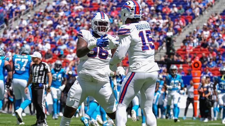 Buffalo Bills defensive tackle Deone Walker reacts to getting a sack with OLB Greg Rousseau. Buffalo Bills defensive tackle Deone Walker reacts to getting a sack with OLB Greg Rousseau.
