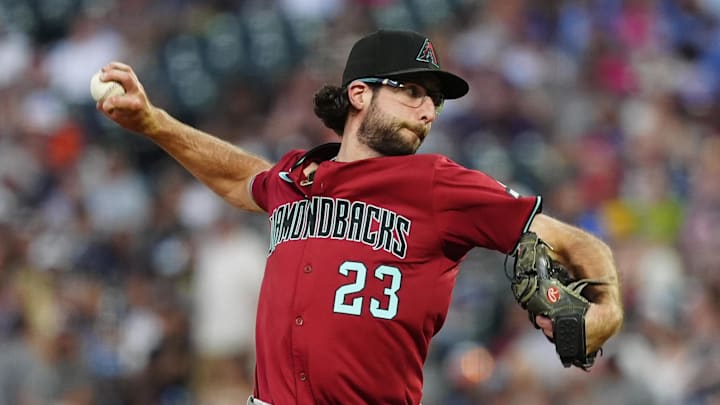 Jun 20, 2025; Denver, Colorado, USA; Arizona Diamondbacks starting pitcher Zac Gallen (23) delivers a pitch in the fifth inning against the Colorado Rockies at Coors Field. Mandatory Credit: Ron Chenoy-Imagn Images Jun 20, 2025; Denver, Colorado, USA; Arizona Diamondbacks starting pitcher Zac Gallen (23) delivers a pitch in the fifth inning against the Colorado Rockies at Coors Field. Mandatory Credit: Ron Chenoy-Imagn Images