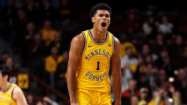 Minnesota Golden Gophers guard Isaac Asuma (1) celebrates his three-point basket Minnesota Golden Gophers guard Isaac Asuma (1) celebrates his three-point basket