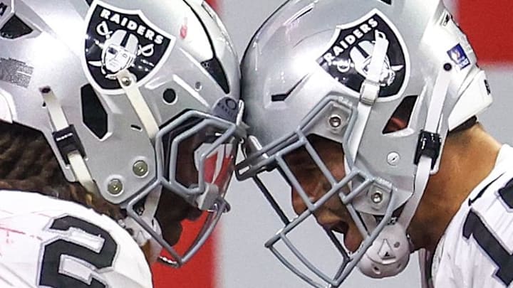 Dec 21, 2025; Houston, Texas, USA; Las Vegas Raiders wide receiver Jack Bech (18) celebrates running back Ashton Jeanty (2) touchdown reception against the Houston Texans in the second half at NRG Stadium. Mandatory Credit: Thomas Shea-Imagn Images