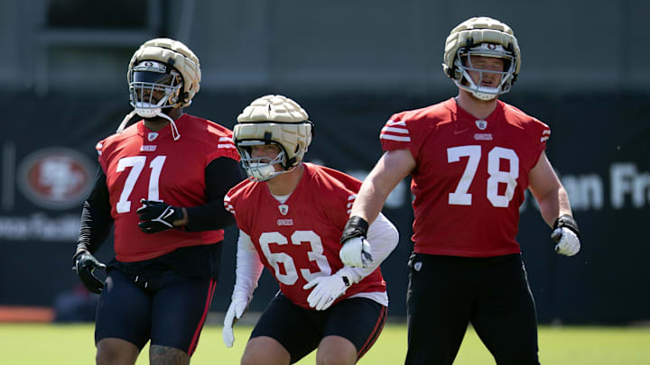 Jun 10, 2025; Santa Clara, CA, USA; San Francisco 49ers offensive linemen Trent Williams (71), Nick Zakelj (63) and Ben Bartch (78) participate in a drill during an OTA at Levi's Stadium. Mandatory Credit: D. Ross Cameron-Imagn Images Jun 10, 2025; Santa Clara, CA, USA; San Francisco 49ers offensive linemen Trent Williams (71), Nick Zakelj (63) and Ben Bartch (78) participate in a drill during an OTA at Levi's Stadium. Mandatory Credit: D. Ross Cameron-Imagn Images