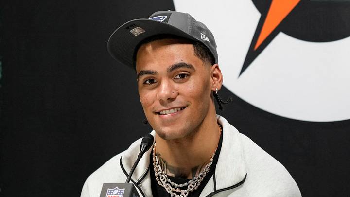 New England Patriots cornerback Christian Gonzalez (0).