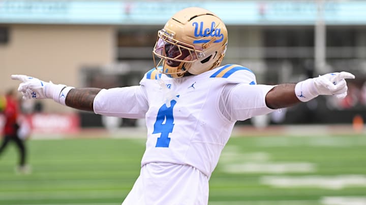 Oct 25, 2025; Bloomington, Indiana, USA; UCLA Bruins defensive back Key Lawrence (4) celebrates after a play during the first half against the Indiana Hoosiers at Memorial Stadium. Mandatory Credit: Robert Goddin-Imagn Images