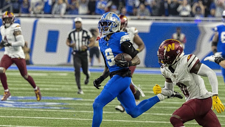 Detroit Lions wide receiver Jameson Williams (9) carries the ball against Washington Commanders 