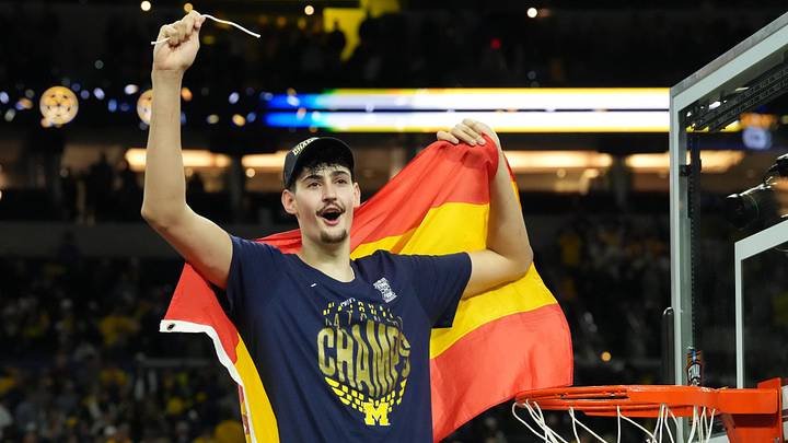 Apr 6, 2026; Indianapolis, IN, USA; Michigan Wolverines center Aday Mara (15) celebrates after cutting down a piece of the net after defeating the Connecticut Huskies in the national championship of the Final Four of the men's 2026 NCAA Tournament at Lucas Oil Stadium. Mandatory Credit: Robert Deutsch-Imagn Images Apr 6, 2026; Indianapolis, IN, USA; Michigan Wolverines center Aday Mara (15) celebrates after cutting down a piece of the net after defeating the Connecticut Huskies in the national championship of the Final Four of the men's 2026 NCAA Tournament at Lucas Oil Stadium. Mandatory Credit: Robert Deutsch-Imagn Images