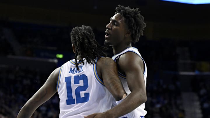 Jan 30, 2025; Los Angeles, California, USA; UCLA Bruins guard Eric Dailey Jr. (3) celebrates with UCLA Bruins guard Sebastian Mack (12) after making a steal of the ball against the Oregon Ducks during the second half at Pauley Pavilion presented by Wescom. Mandatory Credit: Alex Gallardo-Imagn Images