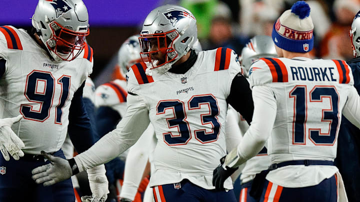 Dec 24, 2023; Denver, Colorado, USA; New England Patriots linebacker Anfernee Jennings (33) and defensive end Deatrich Wise Jr. (91) and quarterback Nathan Rourke (13) react after a play in the first quarter against the Denver Broncos at Empower Field at Mile High. Mandatory Credit: Isaiah J. Downing-Imagn Images Dec 24, 2023; Denver, Colorado, USA; New England Patriots linebacker Anfernee Jennings (33) and defensive end Deatrich Wise Jr. (91) and quarterback Nathan Rourke (13) react after a play in the first quarter against the Denver Broncos at Empower Field at Mile High. Mandatory Credit: Isaiah J. Downing-Imagn Images