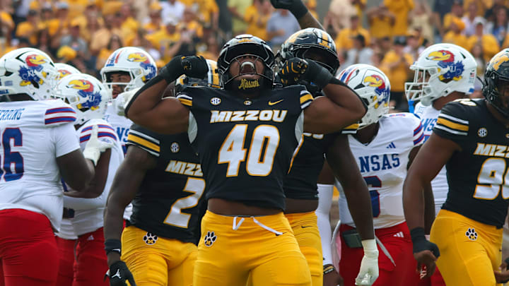 Sep 6, 2025; Columbia, Missouri, USA; Missouri Tigers linebacker Josiah Trotter (40) celebrates a tackle in the first quarter of the Border War against the Kansas Jayhawks at Faurot Field at Memorial Stadium