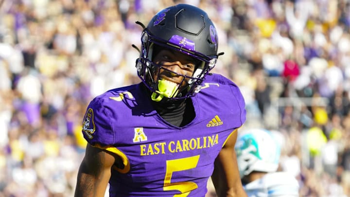 Nov 4, 2023; Greenville, North Carolina, USA;  East Carolina Pirates wide receiver Chase Sowell (5) reacts to his catch against the Tulane Green Wave during the first half at Dowdy-Ficklen Stadium. Mandatory Credit: James Guillory-Imagn Images