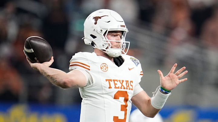 Texas Longhorns quarterback Quinn Ewers (3) throws during the first half of the Cotton Bowl Classic College Football Playoff semifinal game against the Ohio State Buckeyes at AT&T Stadium in Arlington, Texas on Jan. 10, 2025.