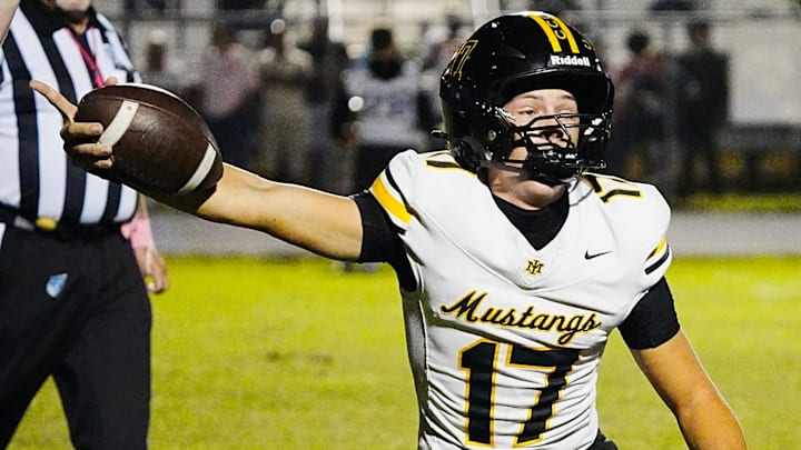 Merritt Island QB Kevin Verpaele indicates a Mustang first down during their game against Titusville October 17, 2025. Craig Bailey, FLORIDA TODAY via USA TODAY NETWORK