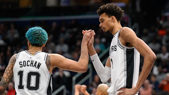 Feb 10, 2025; Washington, District of Columbia, USA; San Antonio Spurs center Victor Wembanyama (1) and San Antonio Spurs forward Jeremy Sochan (10) react during the fourth quarter against the Washington Wizards at Capital One Arena.