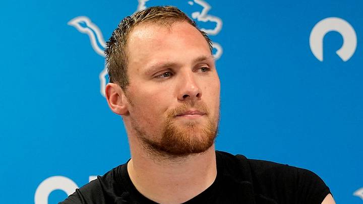 Detroit Lions linebacker Jack Campbell talks with the media during questions at a press conference.