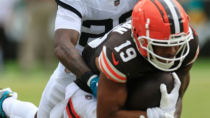 Jacksonville Jaguars cornerback Jarrian Jones (22) tackles Cleveland Browns wide receiver Cedric Tillman (19) during the third quarter of an NFL football matchup Sunday, Sept. 15, 2024 at EverBank Stadium in Jacksonville, Fla. The Browns defeated the Jaguars 18-13. [Corey Perrine/Florida Times-Union]