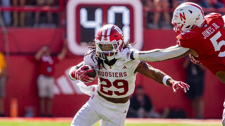 Oct 10, 2026; Lincoln, Nebraska, USA; Indiana Hoosiers running back Lee Beebe Jr. (29) runs against Nebraska Cornhuskers defensive lineman Anthony Jones Jr. (5) during the third quarter at Memorial Stadium. Mandatory Credit: Dylan Widger-Imagn Images Oct 10, 2026; Lincoln, Nebraska, USA; Indiana Hoosiers running back Lee Beebe Jr. (29) runs against Nebraska Cornhuskers defensive lineman Anthony Jones Jr. (5) during the third quarter at Memorial Stadium. Mandatory Credit: Dylan Widger-Imagn Images