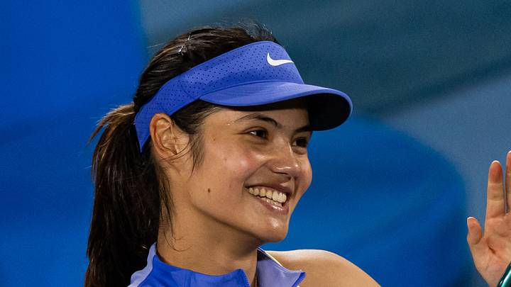 Emma Raducanu smiles after a match