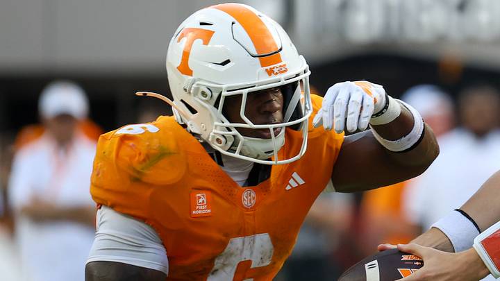 Sep 5, 2026; Knoxville, Tennessee, USA; Tennessee Volunteers quarterback George MacIntyre (12) hands the ball off to running back Javin Gordon (6) during the second half against the Furman Paladins at Neyland Stadium. Mandatory Credit: Randy Sartin-Imagn Images Sep 5, 2026; Knoxville, Tennessee, USA; Tennessee Volunteers quarterback George MacIntyre (12) hands the ball off to running back Javin Gordon (6) during the second half against the Furman Paladins at Neyland Stadium. Mandatory Credit: Randy Sartin-Imagn Images