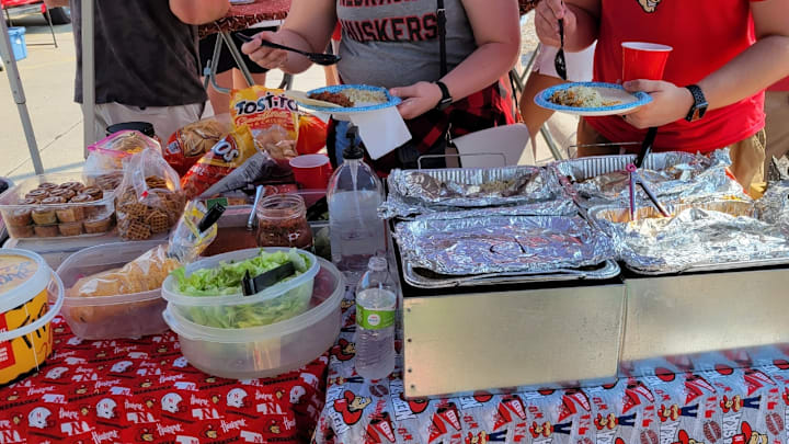 Kelli Anne's tailgate spread has become legendary amongst her friends and family that regularly attend. Kelli Anne's tailgate spread has become legendary amongst her friends and family that regularly attend.