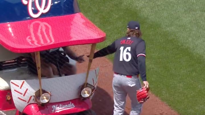 Steven Okert tipping the Nationals bullpen cart driver (May 22, 2024)