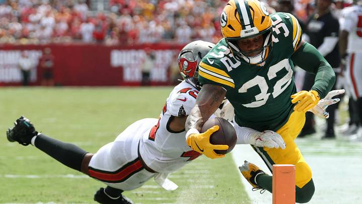 Green Bay Packers running back MarShawn Lloyd (32) dives for the touchdown but stepped out of bounds. Green Bay Packers running back MarShawn Lloyd (32) dives for the touchdown but stepped out of bounds.