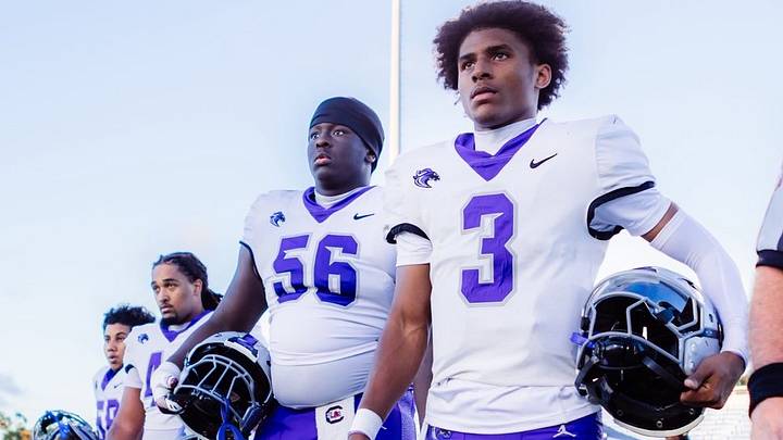 Ridge View offensive lineman James Ross (56) and quarterback Tre Howard (3). Ridge View offensive lineman James Ross (56) and quarterback Tre Howard (3).