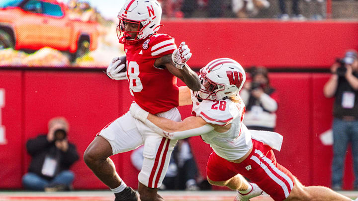 Nov 23, 2024; Lincoln, Nebraska, USA; Nebraska Cornhuskers wide receiver Isaiah Neyor runs after a catch against Wisconsin Badgers linebacker Christian Alliegro.