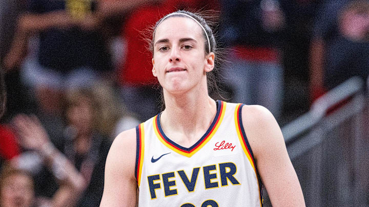 Jul 9, 2025; Indianapolis, Indiana, USA; Indiana Fever guard Caitlin Clark (22) in the first half against Golden State Valkyries at Gainbridge Fieldhouse. Mandatory Credit: Trevor Ruszkowski-Imagn Images
