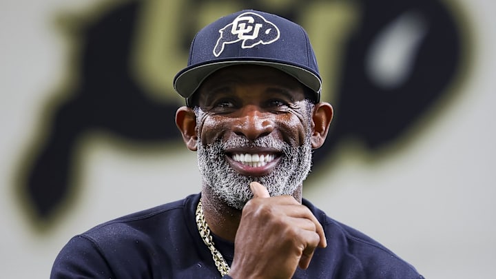 Apr 4, 2025; Boulder, CO, USA; Colorado Buffaloes head coach Deion Sanders watches as his players go through drills at the University of Colorado NFL Showcase at the CU Indoor Practice Facility. Mandatory Credit: Michael Ciaglo-Imagn Images