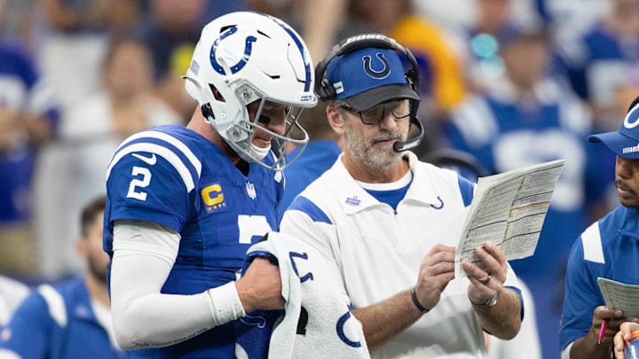 Indianapolis Colts head coach Frank Reich talks with quarterback Carson Wentz