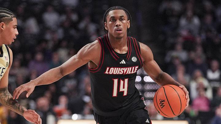Feb 7, 2026; Winston-Salem, North Carolina, USA; Louisville Cardinals guard Adrian Wooley (14) brings the ball up court against Wake Forest Demon Deacons guard Sebastian Akins (10) during the second half at Lawrence Joel Veterans Memorial Coliseum. Mandatory Credit: Jim Dedmon-Imagn Images Feb 7, 2026; Winston-Salem, North Carolina, USA; Louisville Cardinals guard Adrian Wooley (14) brings the ball up court against Wake Forest Demon Deacons guard Sebastian Akins (10) during the second half at Lawrence Joel Veterans Memorial Coliseum. Mandatory Credit: Jim Dedmon-Imagn Images