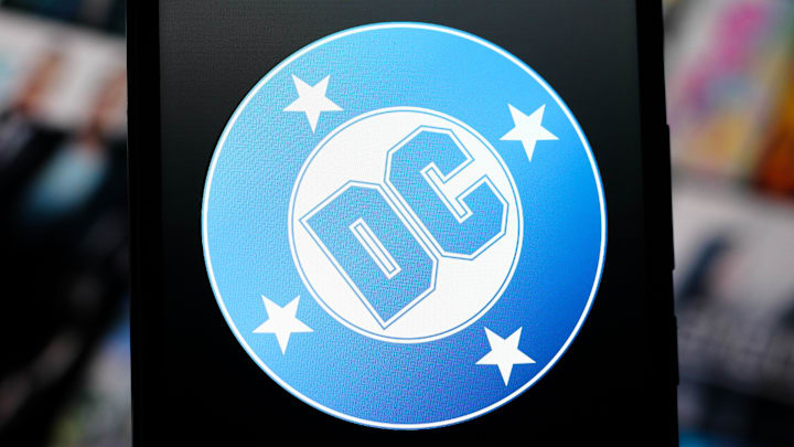 In this photo illustration, the DC Comics logo is seen...