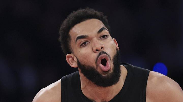 May 21, 2026; New York, New York, USA; New York Knicks center Karl-Anthony Towns (32) reacts as Cleveland Cavaliers guard Max Strus (2) runs up the court during the second quarter of game two of the eastern conference finals of the 2026 NBA playoffs at Madison Square Garden. Mandatory Credit: Vincent Carchietta-Imagn Images
