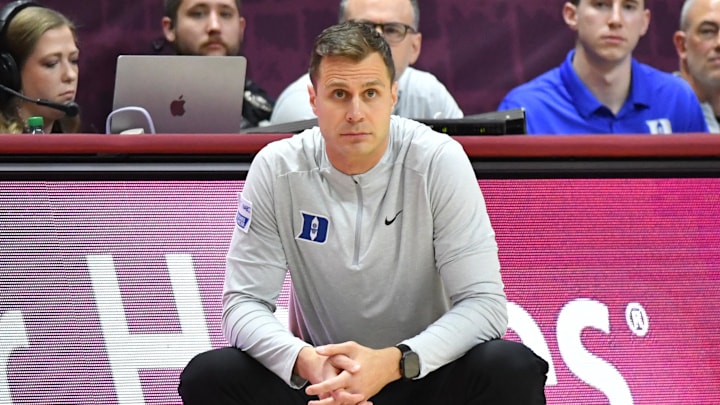 Jan 31, 2026; Blacksburg, Virginia, USA; Duke Blue Devils head coach Jon Scheyer watches his team against the Virginia Tech Hokies during the second half against Virginia Tech Hokies at Cassell Coliseum. Mandatory Credit: Brian Bishop-Imagn Images