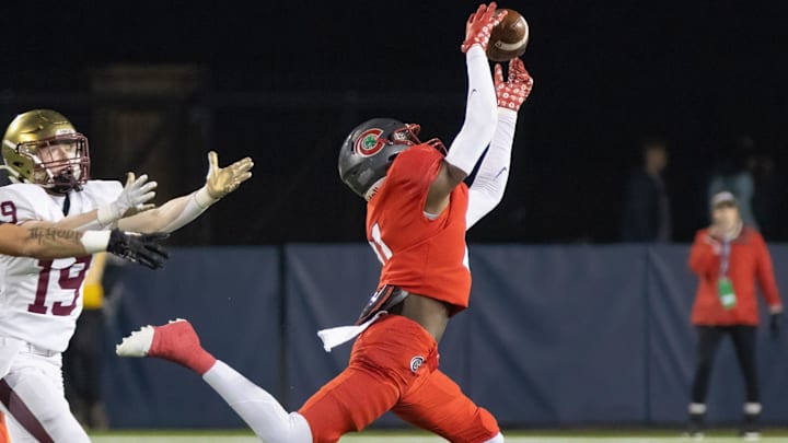 Toledo Central Catholic's Victor Singleton Jr. intercepts a pass intended Bishop Watterson's Cal Mangini ending the Eagles' final drive during the Division III state final Friday, Dec. 1, 2023, in Canton.