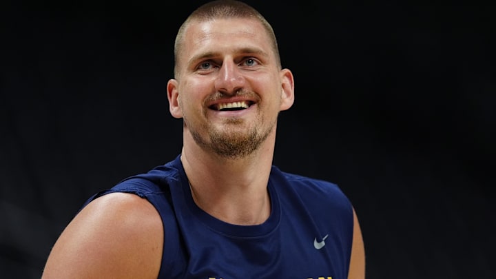 Apr 11, 2025; Denver, Colorado, USA; Denver Nuggets center Nikola Jokic (15) reacts before the game against the Memphis Grizzlies at Ball Arena. Mandatory Credit: Ron Chenoy-Imagn Images Apr 11, 2025; Denver, Colorado, USA; Denver Nuggets center Nikola Jokic (15) reacts before the game against the Memphis Grizzlies at Ball Arena. Mandatory Credit: Ron Chenoy-Imagn Images
