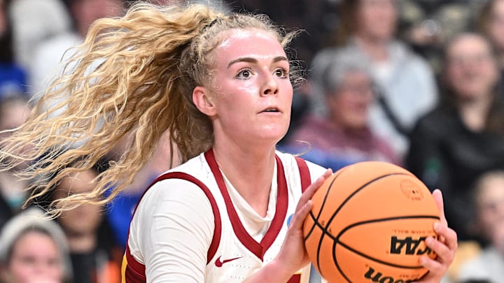 Mar 31, 2025; Spokane, WA, USA; USC Trojans guard Avery Howell (23) shoots against the UConn Huskies during the first half of a Elite 8 NCAA Tournament basketball game at Spokane Arena. Mandatory Credit: James Snook-Imagn Images