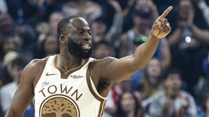 Jan 17, 2026; San Francisco, California, USA; Golden State Warriors forward Draymond Green (23) reacts after hitting a three-point shot against the Charlotte Hornets during the first quarter at Chase Center. Mandatory Credit: John Hefti-Imagn Images