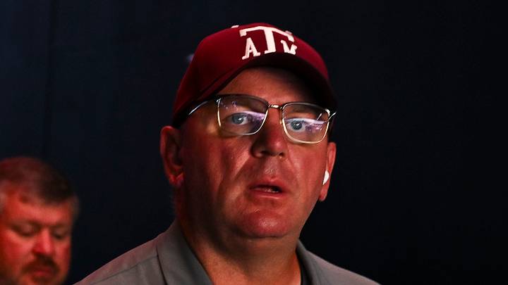 Texas A&M Aggies head coach Mike Elko walks to the field prior to the game against Arizona State Sun Devils at Kyle Field. Texas A&M Aggies head coach Mike Elko walks to the field prior to the game against Arizona State Sun Devils at Kyle Field.