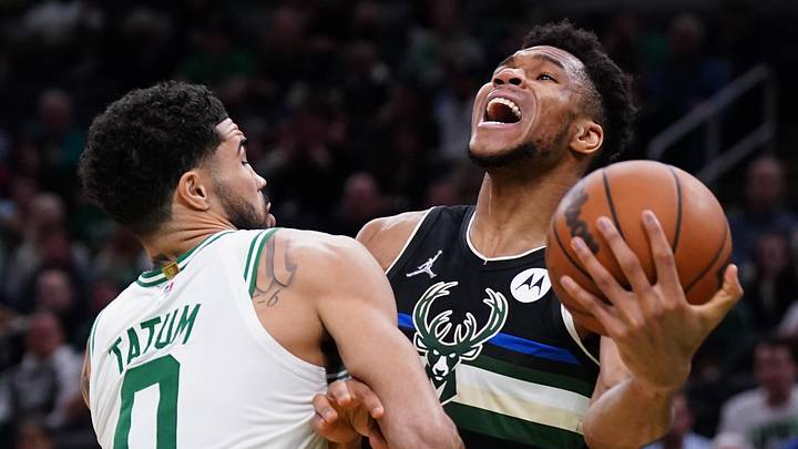 May 11, 2022; Boston, Massachusetts, USA; Boston Celtics forward Jayson Tatum (0) defends against Milwaukee Bucks forward Giannis Antetokounmpo (34) in the second half during game five of the second round for the 2022 NBA playoffs at TD Garden. Mandatory Credit: David Butler II-Imagn Images