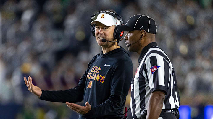 Oct 18, 2025; South Bend, Indiana, USA; Southern California Trojans head coach Lincoln Riley talks to an official during the first half against the Notre Dame Fighting Irish at Notre Dame Stadium. Oct 18, 2025; South Bend, Indiana, USA; Southern California Trojans head coach Lincoln Riley talks to an official during the first half against the Notre Dame Fighting Irish at Notre Dame Stadium.