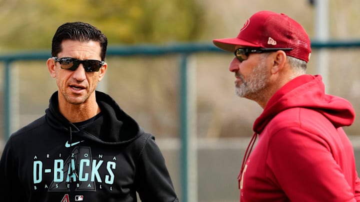 Arizona Diamondbacks general manager Mike Hazen talks to manager Torey Lovullo during spring training workouts at Salt River Fields in Scottsdale on Feb. 17, 2023. Arizona Diamondbacks general manager Mike Hazen talks to manager Torey Lovullo during spring training workouts at Salt River Fields in Scottsdale on Feb. 17, 2023.