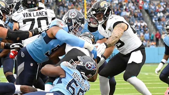 Dec 8, 2024; Nashville, Tennessee, USA; Tennessee Titans defensive tackle T'Vondre Sweat (93) and defensive tackle Sebastian Joseph-Day (69) stop Jacksonville Jaguars running back Tank Bigsby (4) at the goal line during the first half at Nissan Stadium. Mandatory Credit: Steve Roberts-Imagn Images Dec 8, 2024; Nashville, Tennessee, USA; Tennessee Titans defensive tackle T'Vondre Sweat (93) and defensive tackle Sebastian Joseph-Day (69) stop Jacksonville Jaguars running back Tank Bigsby (4) at the goal line during the first half at Nissan Stadium. Mandatory Credit: Steve Roberts-Imagn Images