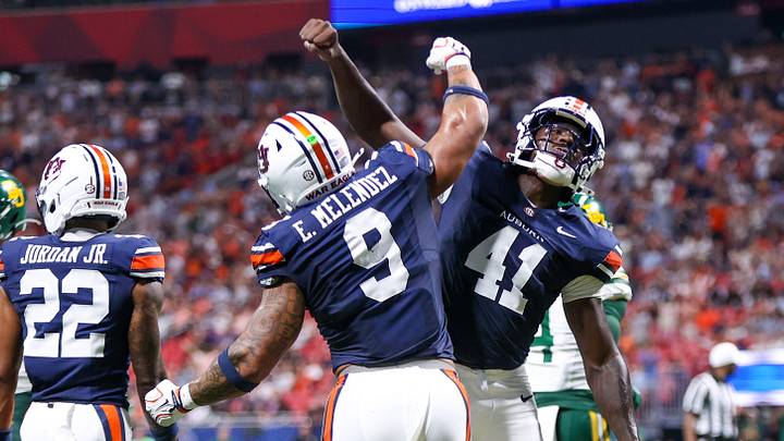Sep 5, 2026; Atlanta, Georgia, USA; Auburn Tigers linebacker Elijah Melendez (9) and defensive end Jared Smith (41) celebrate after a play against the Baylor Bears in the fourth quarter at Mercedes-Benz Stadium. Mandatory Credit: Brett Davis-Imagn Images