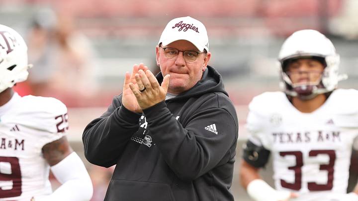 Texas A&M Aggies head coach Mike Elko prior to the game against the Arkansas Razorbacks at Donald W. Reynolds Razorback Stadium Texas A&M Aggies head coach Mike Elko prior to the game against the Arkansas Razorbacks at Donald W. Reynolds Razorback Stadium