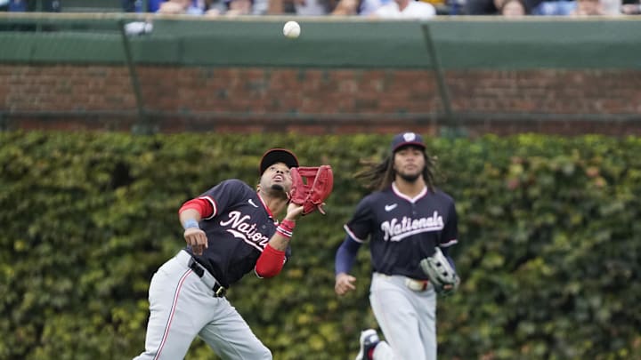 Sep 22, 2024; Chicago, Illinois, USA; Washington Nationals shortstop Nasim Nuñez (26) makes a catch on Chicago Cubs catcher Miguel Amaya (not pictured) during the second inning at Wrigley Field. 