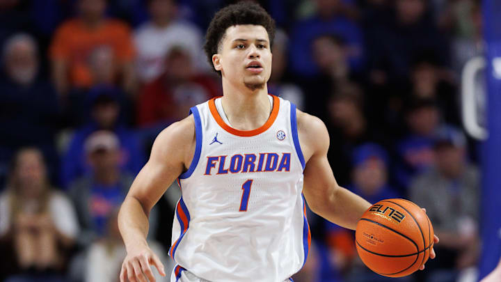 Dec 21, 2024; Gainesville, Florida, USA; Florida Gators guard Walter Clayton Jr. (1) dribbles the ball against the North Florida Ospreys during the second half at Exactech Arena at the Stephen C. O'Connell Center. Mandatory Credit: Matt Pendleton-Imagn Images